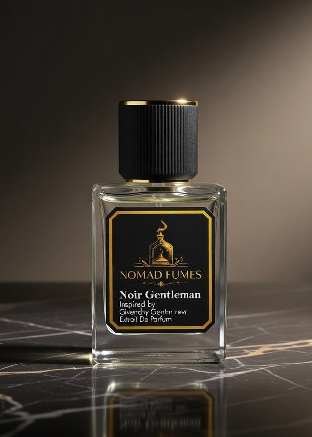 Perfume bottle labeled 'Noir Gentleman' by Nomad Fumes on a dark marble surface.