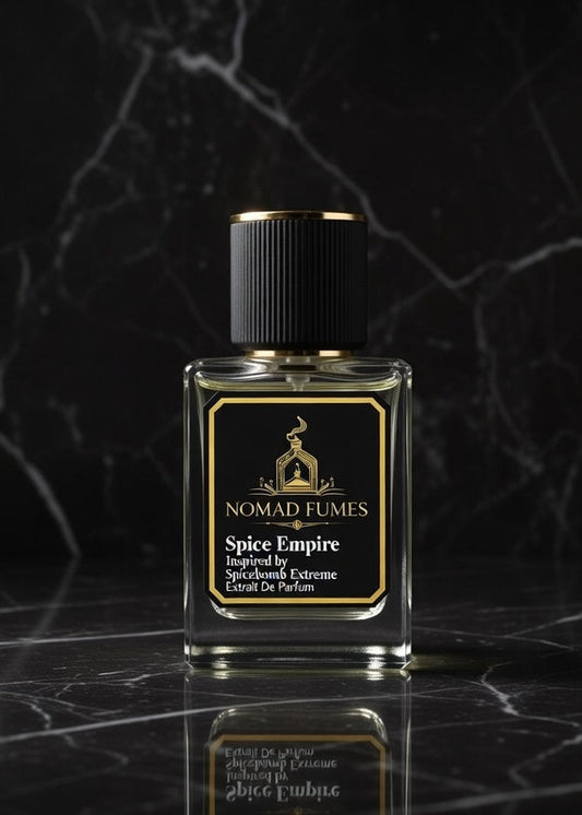 Perfume bottle labeled 'Nomad Fumes' on a dark marble surface