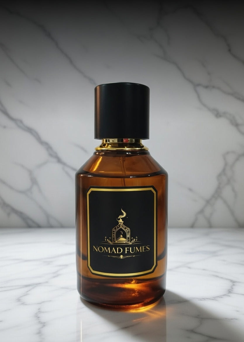 Brown bottle with black cap on a marble surface